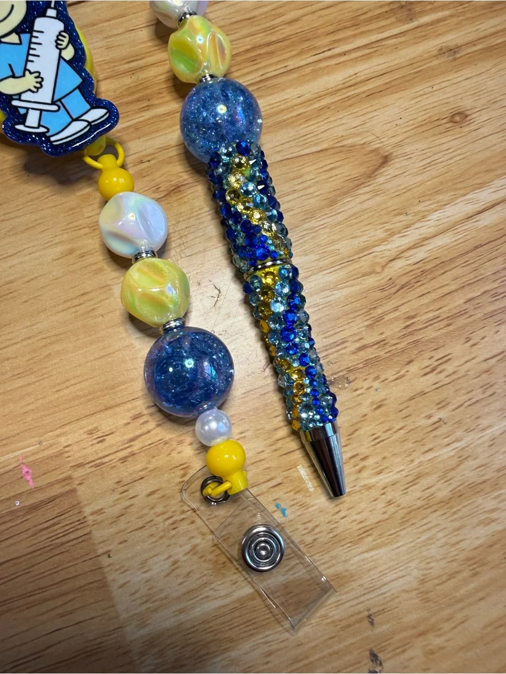 Peanuts Sally Nurse Blue Rhinestone Beaded Pen and Matching Badge Reel Set